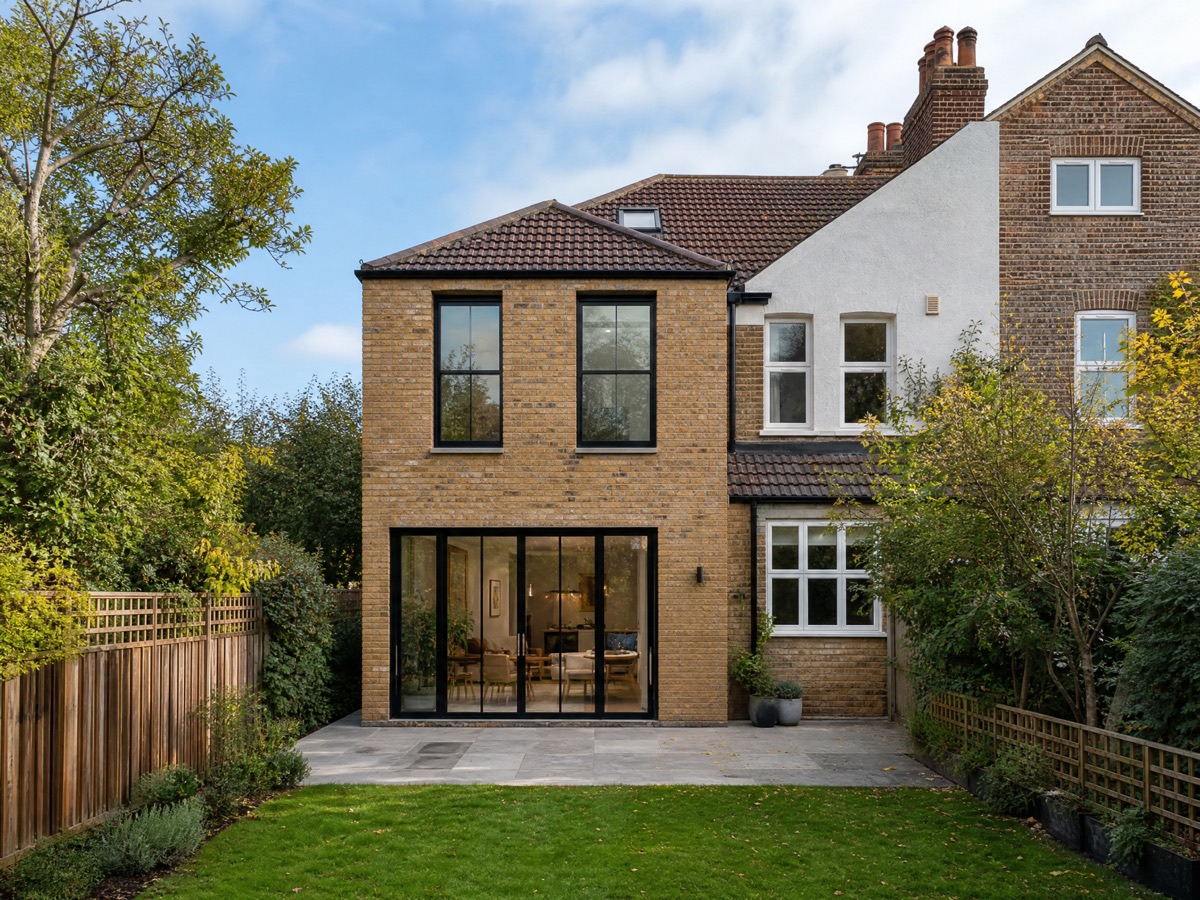 Concept image of a two-storey rear extension in matching brick
